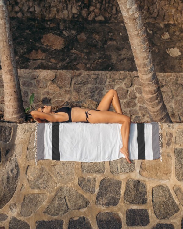 Arzi Beach Towels - The Zephyr (Black & Grey) on the wall